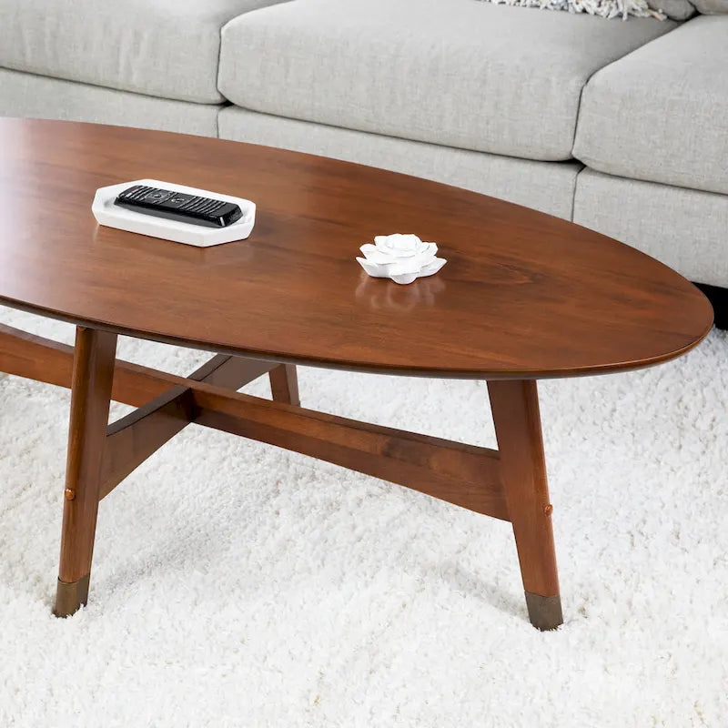 Table basse ovale marron/noire/blanche/grise, piètement en X, pieds recouverts de métal, montage par 1 personne
