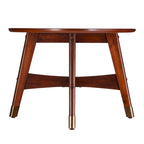 Table basse ovale marron/noire/blanche/grise, piètement en X, pieds recouverts de métal, montage par 1 personne
